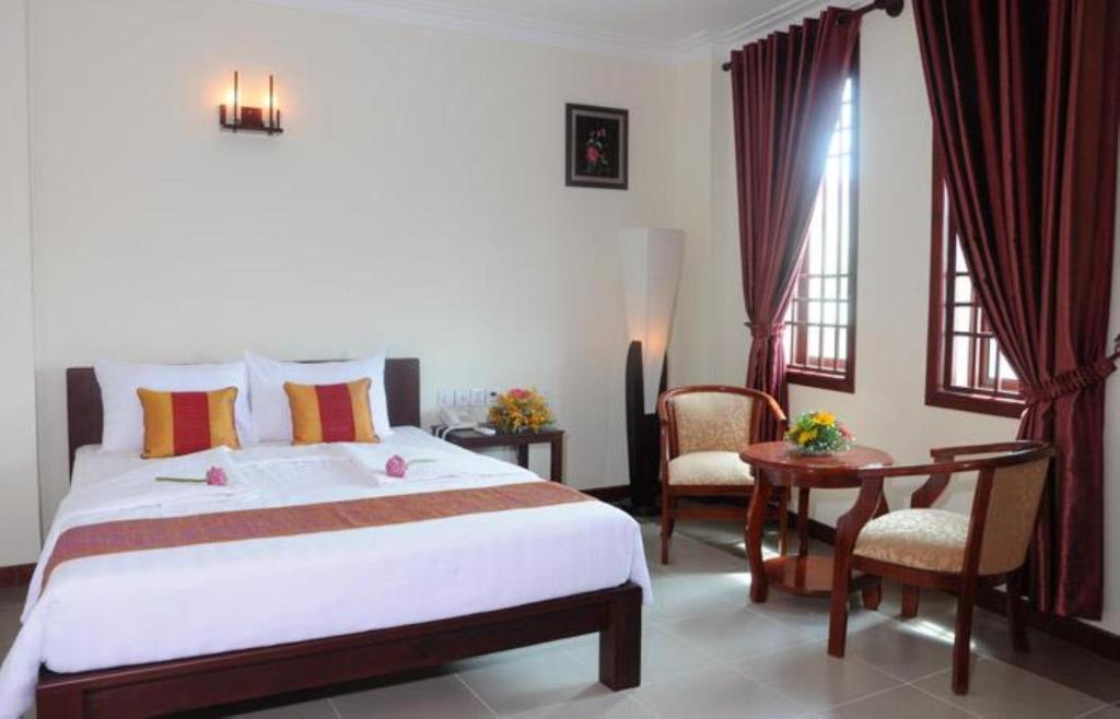 V N E Hotel Phnom Penh Ruang foto