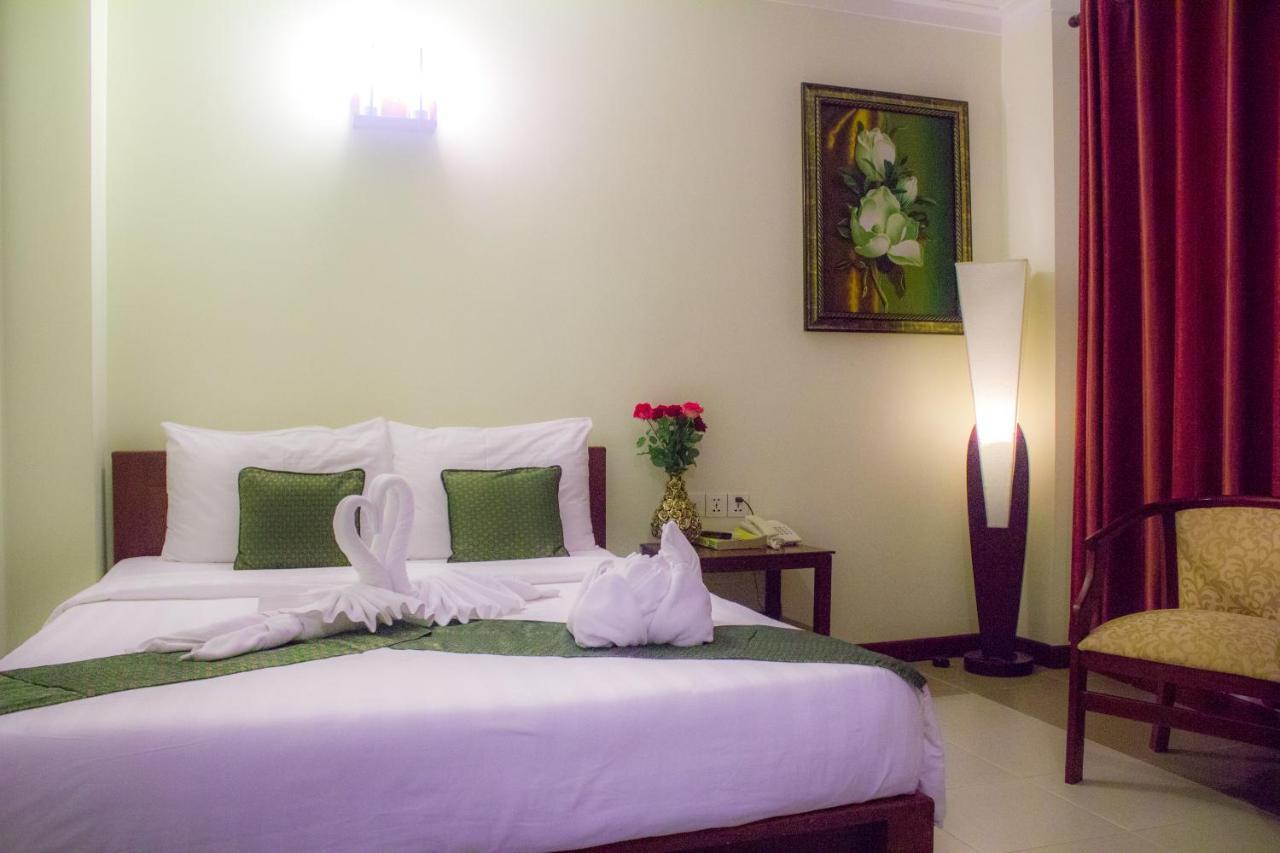 V N E Hotel Phnom Penh Bagian luar foto