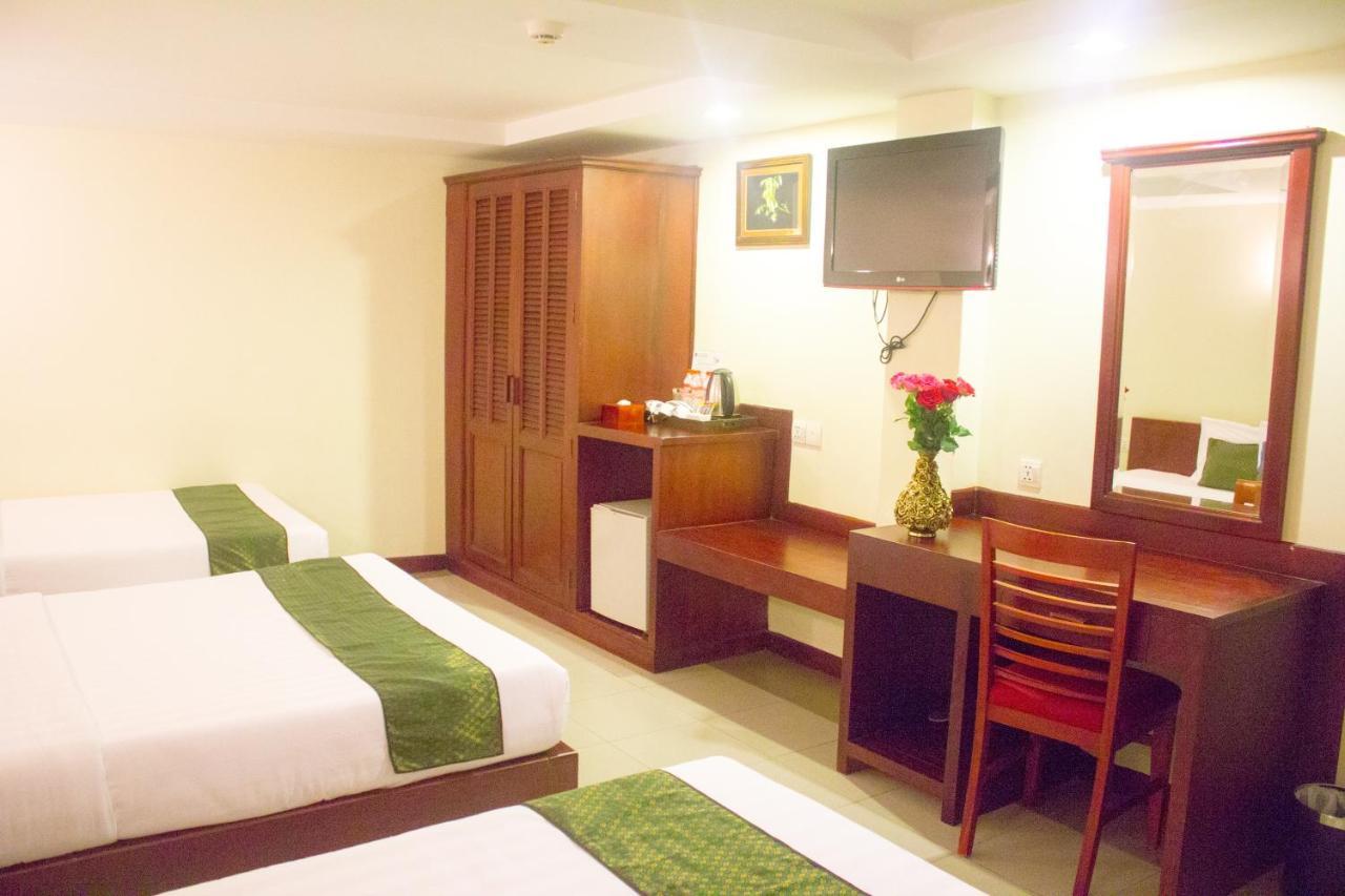 V N E Hotel Phnom Penh Bagian luar foto