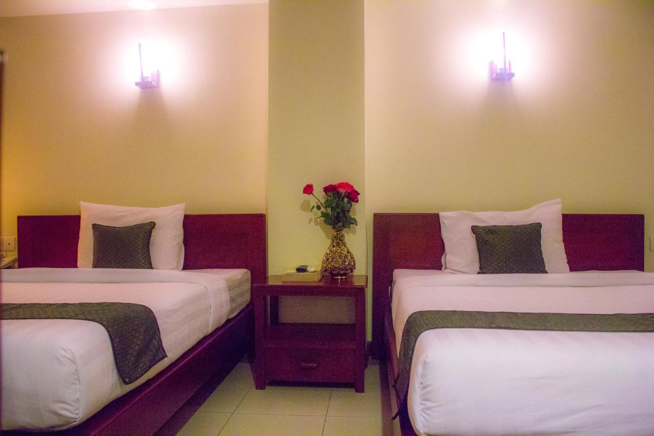 V N E Hotel Phnom Penh Bagian luar foto
