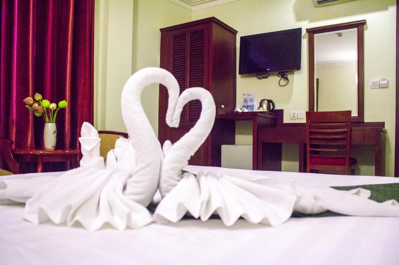 V N E Hotel Phnom Penh Bagian luar foto